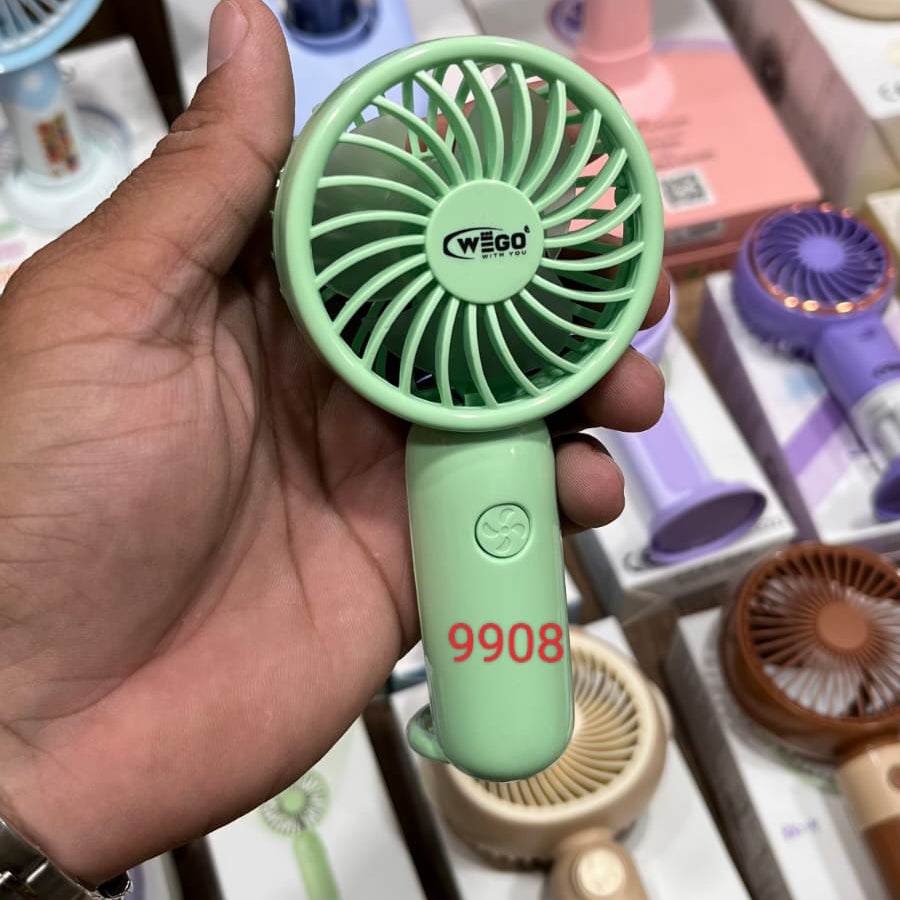 Wego handheld portable mini fan green color.