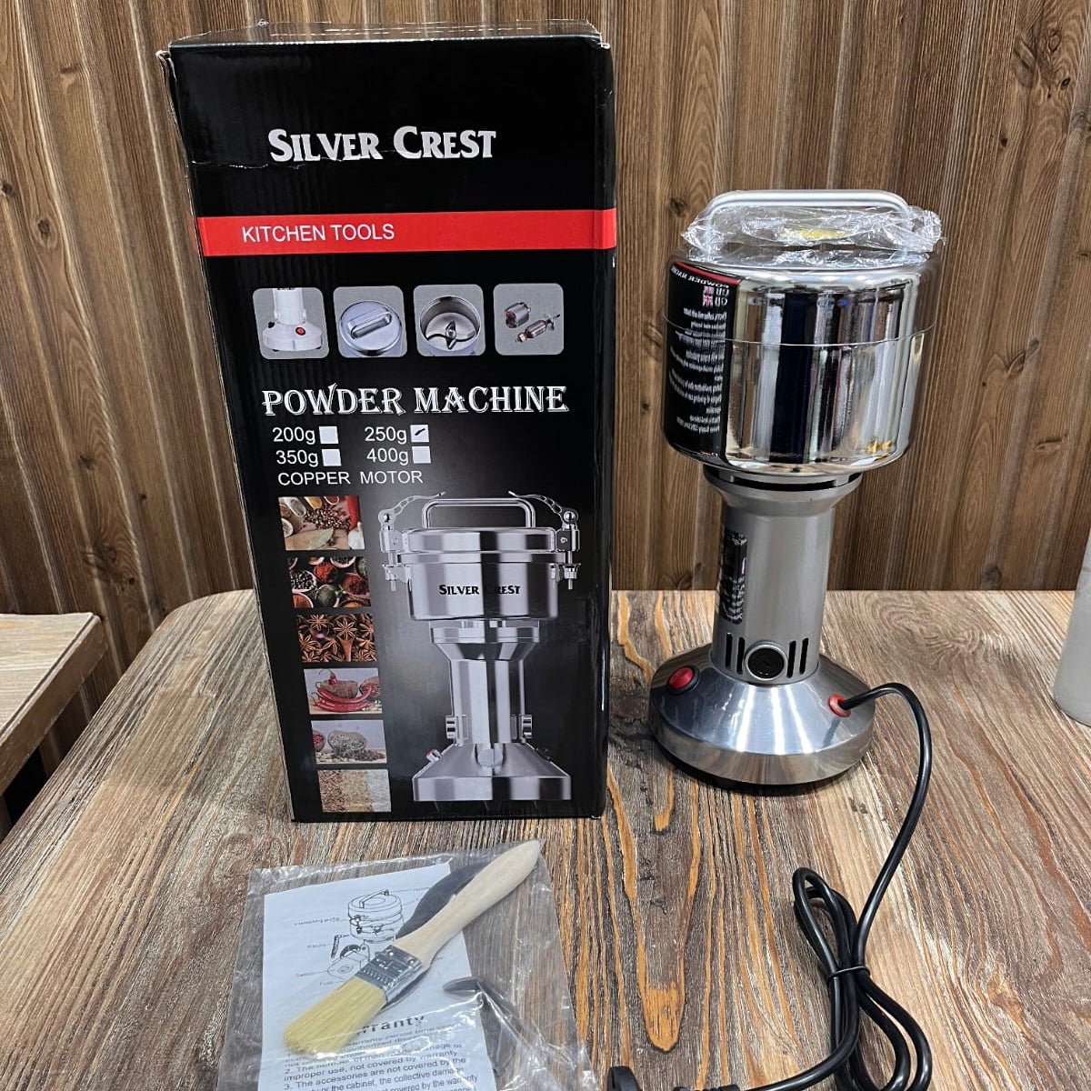 Silver Crest 250g electric powder grinder with a stainless steel body