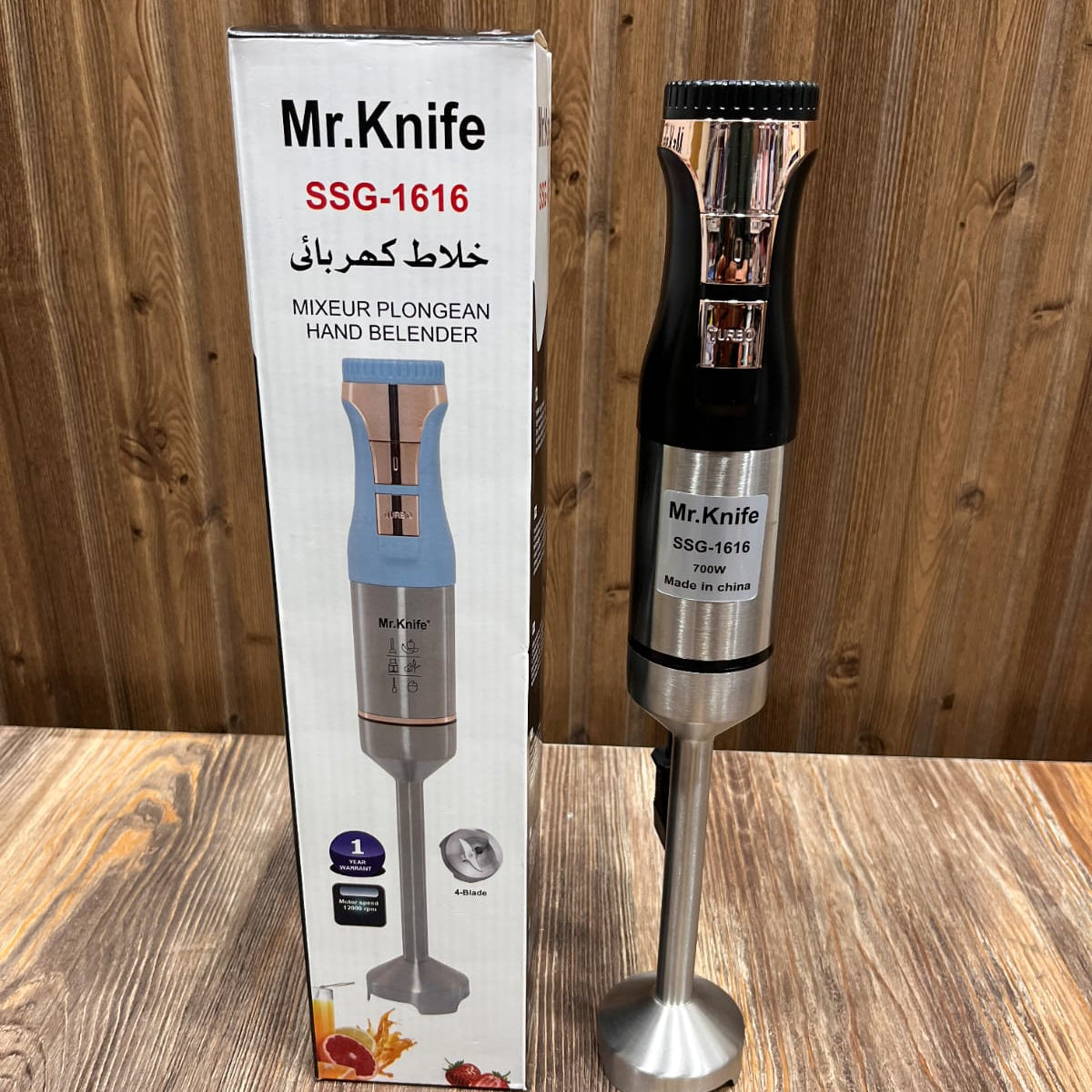Mr.Knife  700W hand blender with a stainless steel body and 4-blade design.