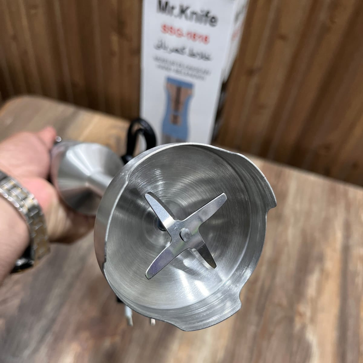 Mr.Knife  700W hand blender with a stainless steel body and 4-blade design.