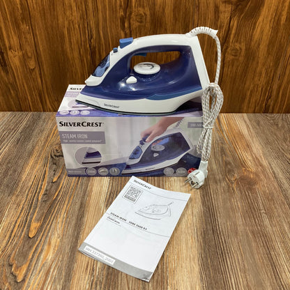 SilverCrest steam iron, or similar, featuring a blue and white design with a ceramic soleplate.