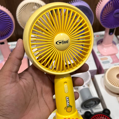 WEGO portable handheld cooling fan with a fruit design on the handle