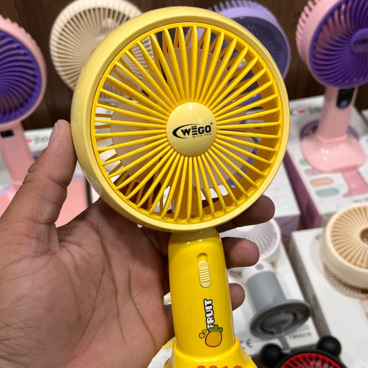 WEGO portable handheld cooling fan with a fruit design on the handle