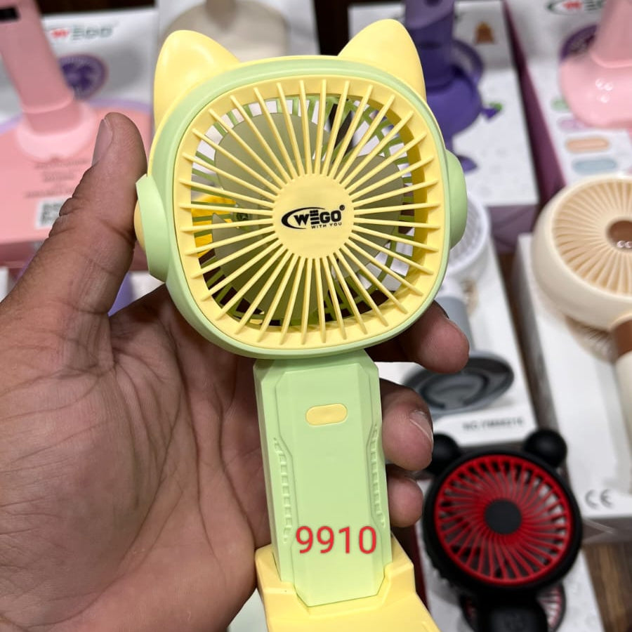 WEGO rechargeable cartoon handheld fan with a yellow cat-eared fan head and a light green handle..