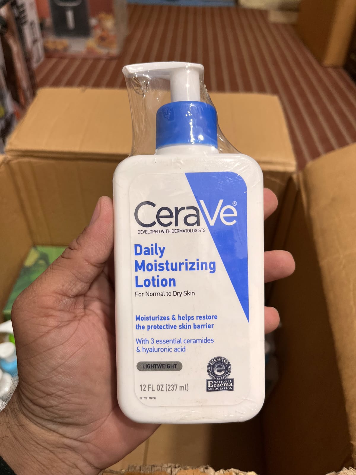 CeraVe Daily Moisturizing Lotion for normal to dry skin, specifically in the 12 fluid ounce (237 ml)