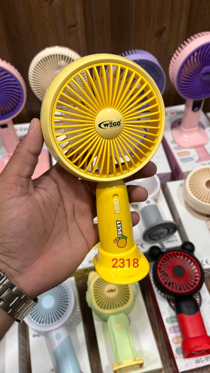 WEGO portable handheld cooling fan with a fruit design on the handle