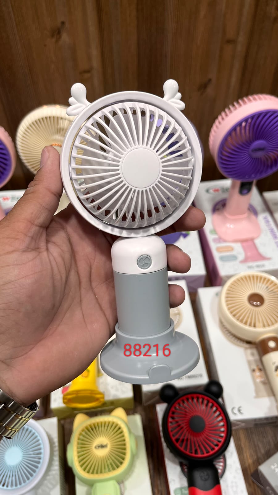Wego portable USB rechargeable handheld mini fan with a desk stand and deer ear design