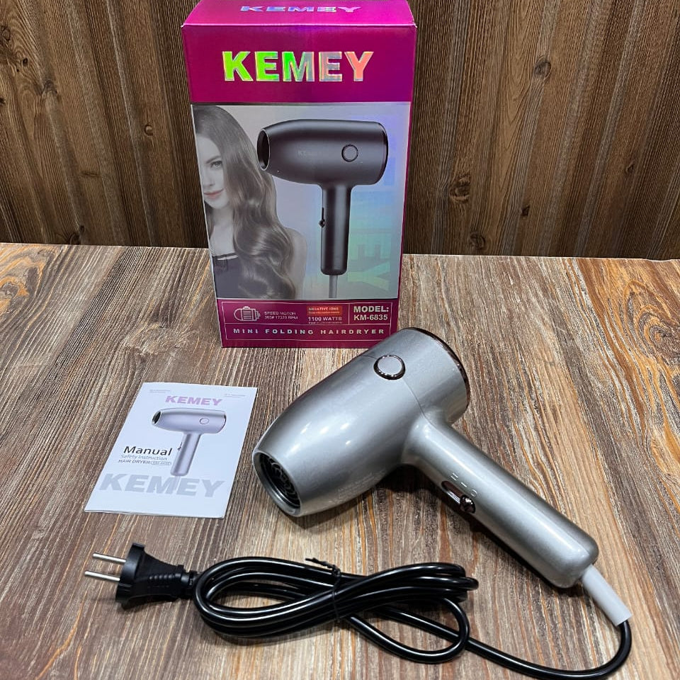 Kemei KM-6835 Travel-Friendly Folding Hair Dryer – Compact Hammer Style with Overheat Protection